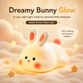 Rechargeable rabbit night light glowing beside a child's bed