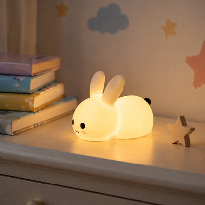 Farotiva rabbit silicone night light glowing on a bedroom shelf